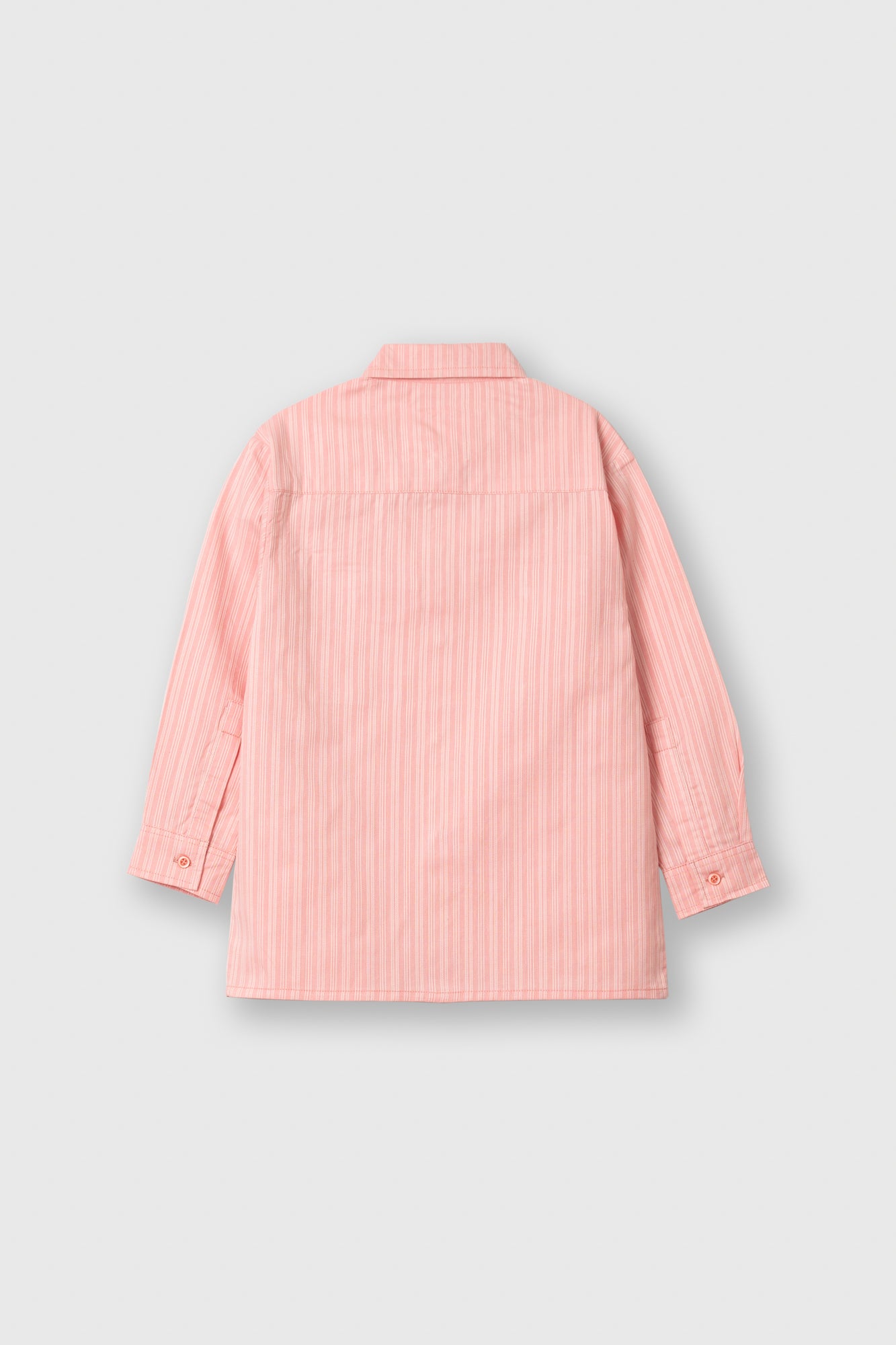 2. Soft Peach Button-Down Boys’ Casual Shirt